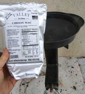 This full package of Cheesy Mac is a great easy road meal for a family of 4. Boiling over a quart of water and cooking the pasta to done takes a while with sticks and leaves, but it does work, and it is all you need. 