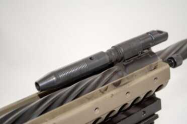 Gun Review: LWRC R.E.P.R. 20 .308 Sniper Model The piston cup drives the operating rod (not shown here) to the left in this photo.