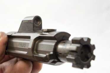 Gun Review: LWRC R.E.P.R. 20 .308 Sniper Model Gas key? Nope. The operating rod smacks this cup to drive the bolt and carrier.