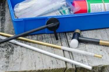 Squib rods can be purchased, like the polymer rod shown, or a simple brass or aluminum rod from the hardware store can be used. Hammer is optional, but recommended.