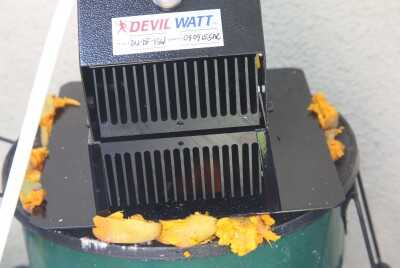 This may seem silly, but I try to solve problems with things I can find on the ground when I am working on survival stuff. I wanted to seal off the bottom plate of the 15 watt open flame Devil Watt so I used these fruits that fell from one of my trees. I don't know if you can eat them, but they make a great seal to get the power rocking along. 