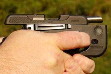 Carrying the Taurus Curve Though the gun is small, the slide still has clearance over my big hands.