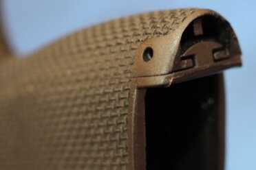 There's still a small gap in the back-strap.