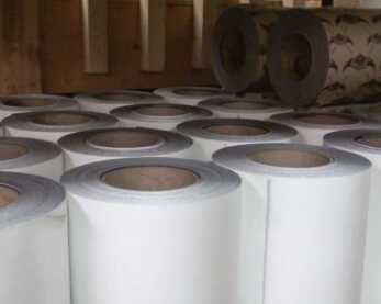 It all starts with large rolls of granulate or rubber material.