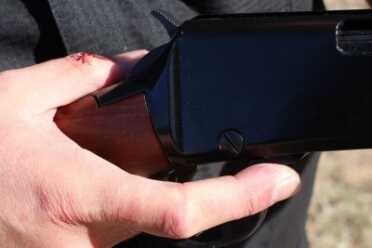 Gallery Gun Fun Henry's Pump 22 My trigger finger is on the release lever. In order to reach it I had to shift my grip which placed my thumb in the way of the bolt.