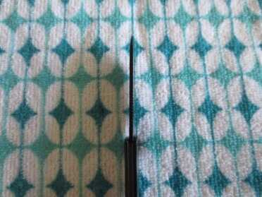 Spine shot.  It's thin.  Don't want to stress this baby too much.  But the locking mechanism is great, strong -- no wiggle!  