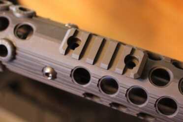 Vent holes allow for air circulation, and for the attachment of rail sections.