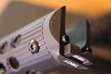 The rear of the forend mates with the receiver.