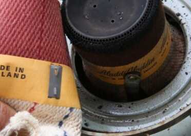 This is a closeup of the different types of Aladdin wick hardware. My heater has a button, but the hooks will probably work. 