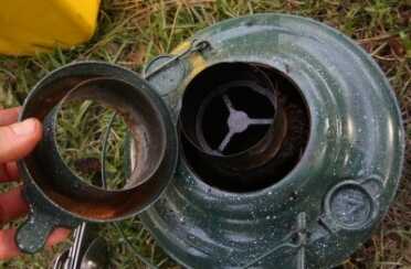 This is the Perfection burner and tank I bought without a shell, just to see. The wick collar is stuck and needs to be cut and pried off. 