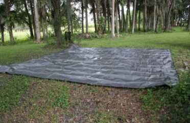 It was not as easy as I thought to find four trees that were square enough to each other to tie up the four corners.  I chose the 20x20 size figuring that it would be easy, but it was not. 