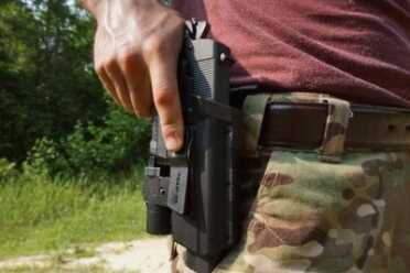 Press the lever to release.