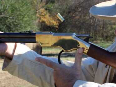 Throwing brass and slinging lead.