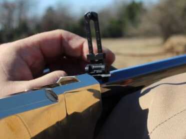 The rear sight flips up for long yardage--an afterthought for most cowboy action shooting.