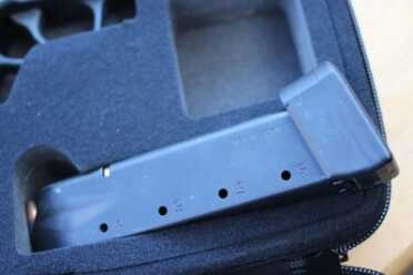 And my preffered mags won't fit. The 20 roudners are too big for the cut out. Two minutes with an X-Acto would fix that. 