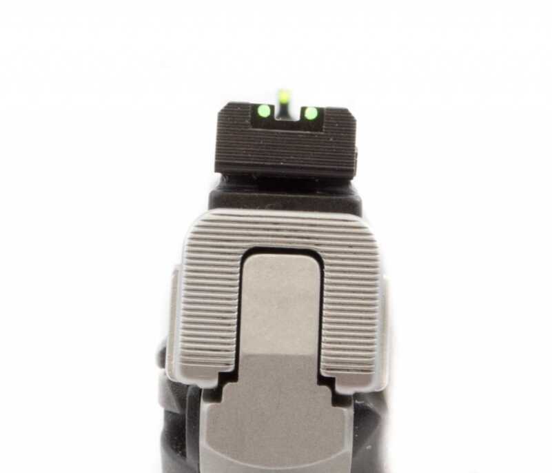 The receiver and rear sight are serrated to reduce glare. 