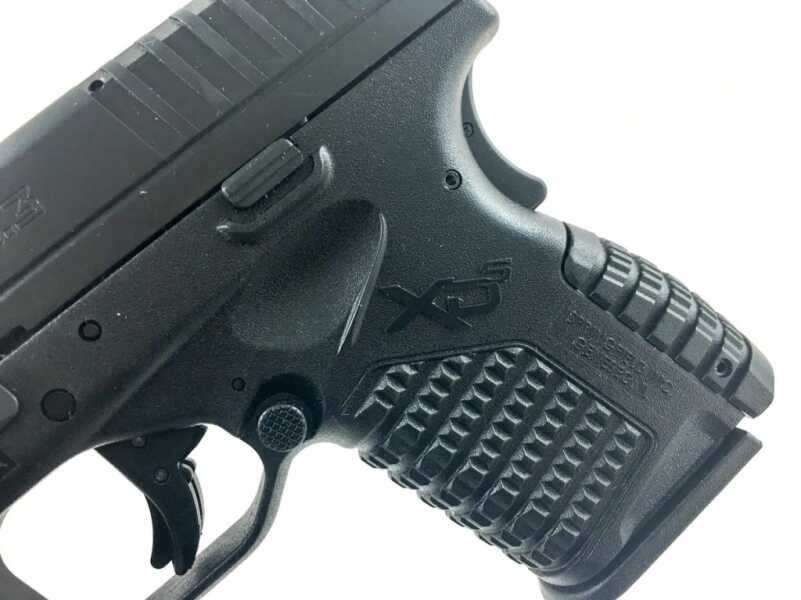 The magazine release is truly ambidextrous - identical buttons are on both sides. 