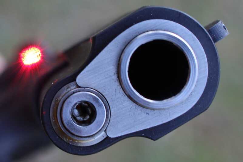New Gun Review: Springfield 1911, Loaded Parkerized with Crimson Trace Not the view of the laser you want to see.