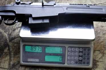 The gun comes in at 8.975 pounds.