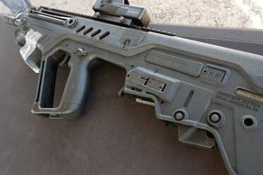 The receiver is marked 223, but this is the 300 Blackout Tavor. IWI used the tape to make sure the rifles and ammo were not mixed at the range.