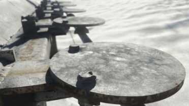 Steel plate rack. While not in official Steel Challenge matches, outlaw steel matches usually have some version of a plate rack, a Texas Star, or any of a variety of challenging steel targets.