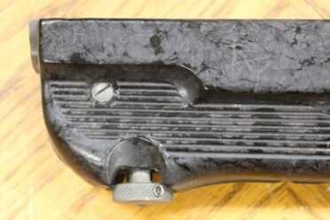 Take down knob bottom of fore end notice Bakelite.