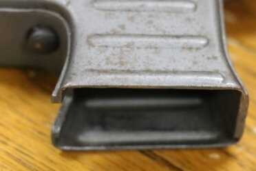 Magazine well ridges stamped to add strength.