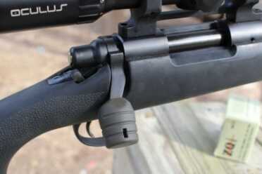 Improving The Remington 700--Part 1--Buy a Rifle The bolt on this SPS has been enhanced with a big fat knob on the handle.