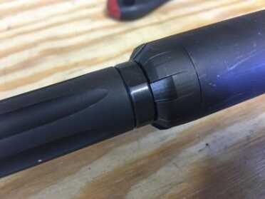 Review: Smith & Wesson M&P 15-22 Performance Center Rifle The SilencerCo Sparrow is hardly larger in diameter than the barrel. Shown here with the spacer installed.