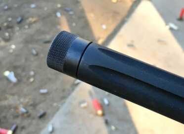 Review: Smith & Wesson M&P 15-22 Performance Center Rifle The forward section of the bull barrel is fluted and capped with a thread protector.