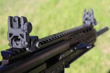 The CMR-30: Kel-Tec's Compact Powerhouse--New Gun Review Magpul MBUS Irons and a very AR-15 like sight radius.