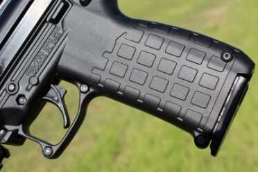 The CMR-30: Kel-Tec's Compact Powerhouse--New Gun Review Gripping the gun isn't enough to drop the mags. You have to hit it with your thumb or finger.