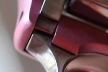 The crane stops on the trigger guard.