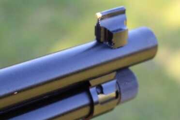 The new front sight. Taller, and with a nice brass bead.