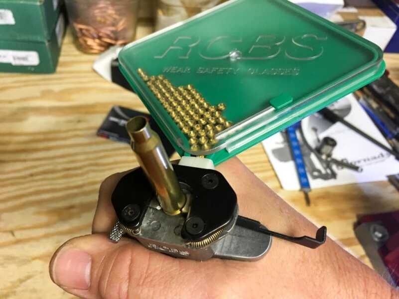 A hand priming tool like this RCBS Universal model is quick and easy.