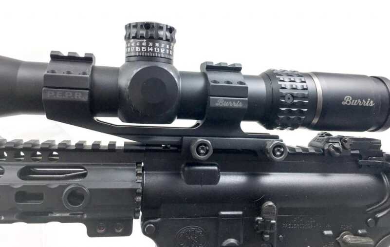 Optics Buying Guide: Scope Mounts When putting a scope on an AR, you'll usually want offset mounts like this Burris AR P.E.P.R. Mount.