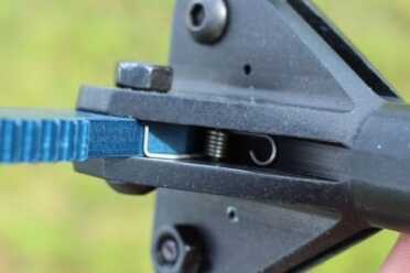 The arms are spring loaded.