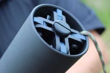 Inserted in the can, it fits flush. Note the cord sticking out.