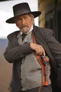 From a distance all Colt and Colt-style Single Actions look about the same. The new Uberti Cattleman II closes the distance. The Uberti is pictured in an El Paso Saddlery Tombstone Speed Rig shoulder holster based on the .c 1895 Al. Furstnow design. (Hat courtesy Golden Gate Western Wear)