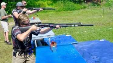 Michelle Cerino, with husband Chris and son Colton, at the Armalite 3 Man Team Match - 3 gun with coaching encouraged!