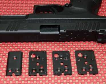 First Look! Springfield Armory XDM Optical Sight 9mm Pistol (OSP). Full Review. The XDM OSP uses three adapter plates to accommodate a number of popular reflex sights. The Melonite cover is used when no optic is mounted.
