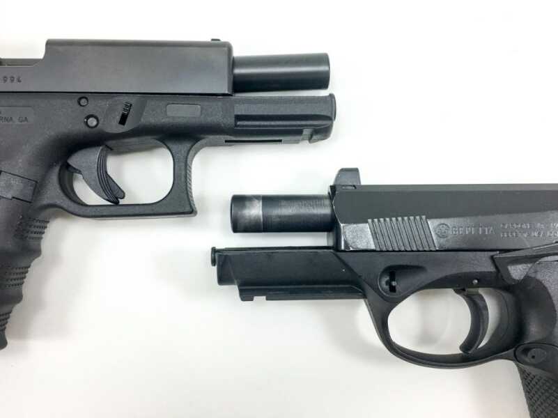 The Glock 19 (top) uses a tilting barrel short recoil system while the Beretta PX4 Storm (bottom) uses a rotary locking system. 