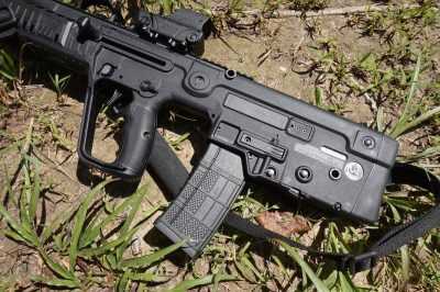 The bullpup concept locates the action into the rear buttstock area and behind the trigger, resulting in a very short and compact weapon.