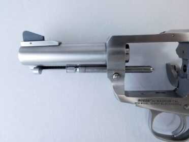 Grizzly-Busting Snubbie? Ruger Super Blackhawk Bisley .44 Mag.—Full Review Removing the cylinder is a snap. Simply open the loading gate, depress the button on the side of the frame (base pin lock button), and draw the base pin forward all the way. The cylinder drops out the right side of the frame. Reverse to reassemble.