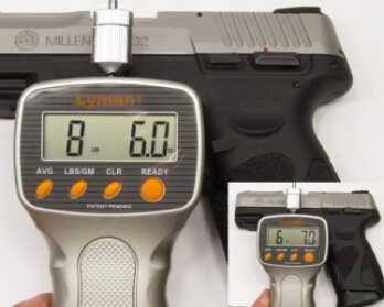 The PT 111 has a unique single-action and double-action trigger. Single-action trigger pull weight was about two pounds heavier than the double-action trigger pull weight (inset).