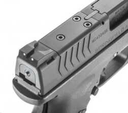 Rob Leatham Tips & Tactics On Shooting a Handgun with a Red Dot The OSP comes with a plate system for attaching optics to the pistol. Shown with cover plate attached.