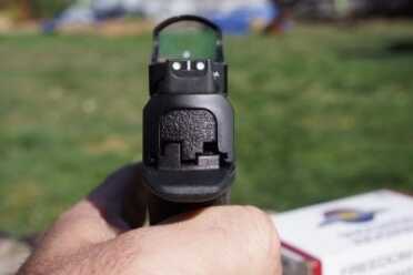 The C.O.R.E. comes standard with suppressor-height sights that make co-witnessing with a red dot such as this Burris FastFire3 a possibility.