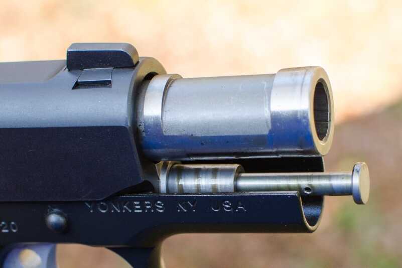 The pistol employs a telescoping recoil spring assembly due to the short length of the slide and barrel. 