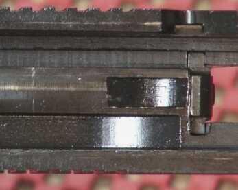 The 1911P is a Series-70 pistol, as noted by the absence of a firing pin safety block.