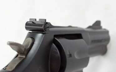 The rear sights are adjustable for windage and elevation.